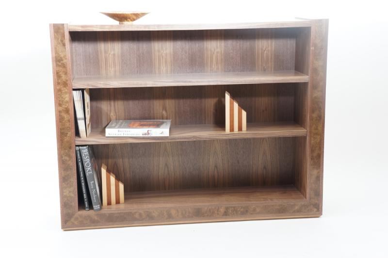 Bookcase in walnut by Dovetailors