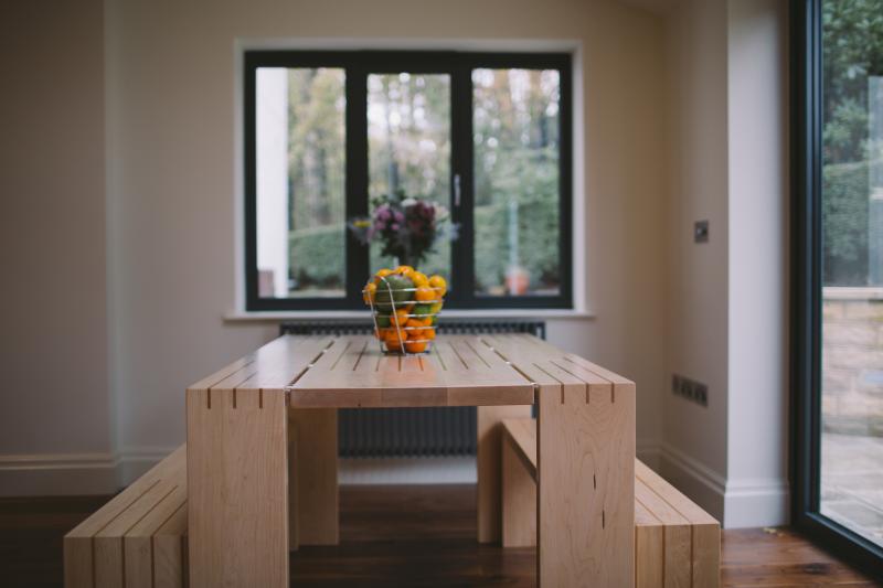 Dining table  and benches by Dovetailors